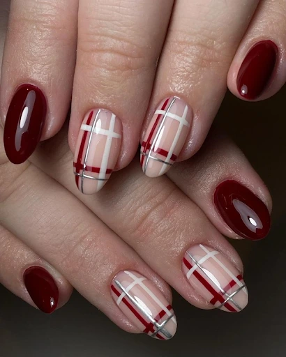Image of a cozy red and cream plaid accent nails