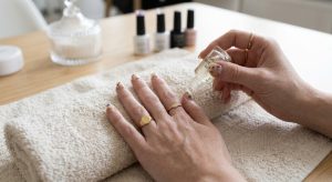 Drying hands and applying cuticle oil as rainy season nail care